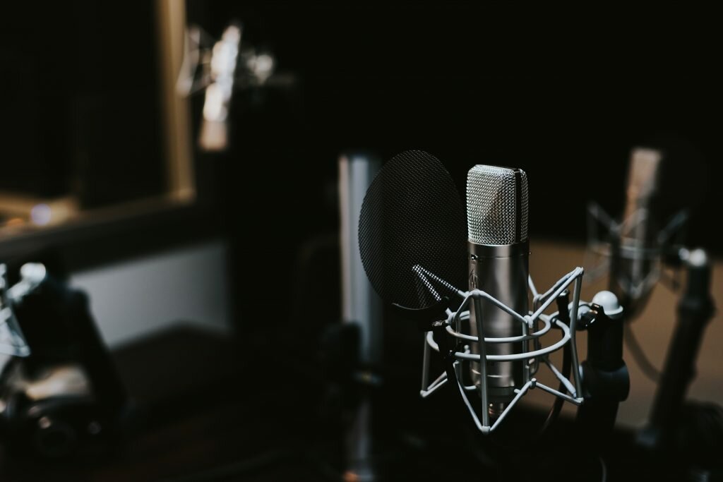 Image of a microphone in a recording studio